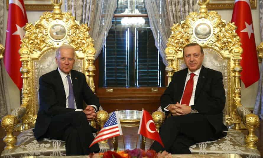 Then vice-president Joe Biden, left, poses for photographers with Turkey’s President Recep Tayyip Erdogan, right, prior to their meeting at Yildiz Mabeyn Palace in Istanbul, in 2016.