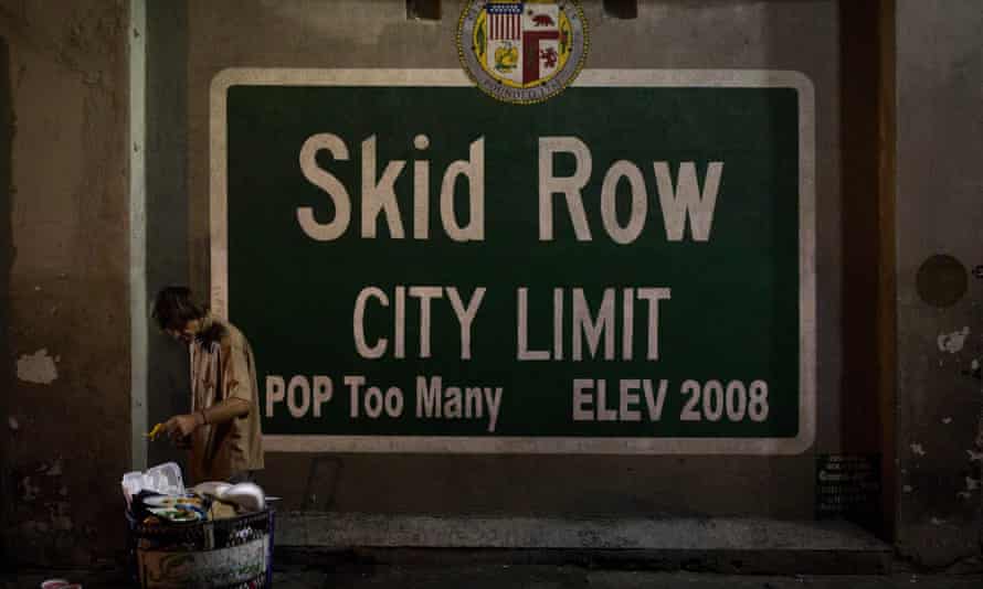 skid row sign says 'population: too many'